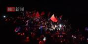 青年学子凌晨擎国旗上贺兰山滚钟口 共庆五四迎日出