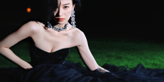 倪妮身着黑色抹胸长裙小秀事业线