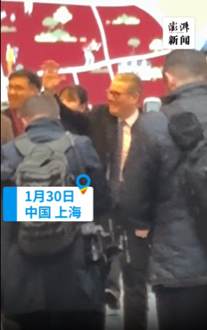 英首相抵达上海 雨中散步豫园 初度访沪体验传统文化