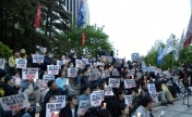 岸田访韩前夕，韩民众举行“反日烛光抗议集会”