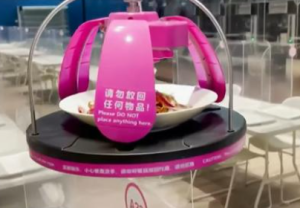 外媒赞叹北京冬奥餐厅像科幻电影：机器人从天花板上送餐