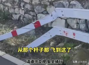 北京一男子騎摩托跑山超車失控撞護欄,，路人合力救援