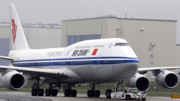 U.S. scraps plans to ban Chinese airlines, limits flights to two a week