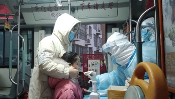 Hundreds of buses become mobile coronavirus test sites in N China