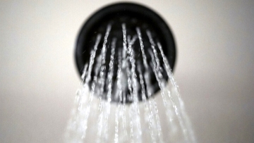 Rules eased for water from showerheads, a Trump pet peeve