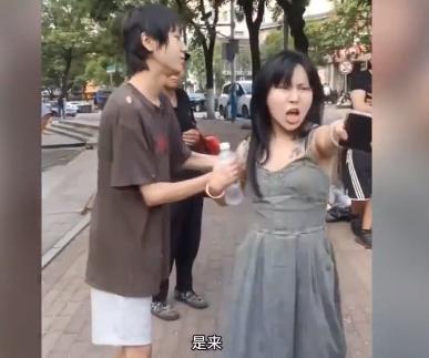 女子疑酒驾找男朋友顶包 “我怀孕四、五个月了，你敢动我？”一女子在出车祸后当街如是说道