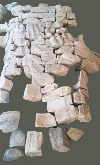 　研究者依据考古发掘出的残片，对第20窟西壁立佛碎块拼对组合初形。
