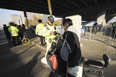 北京或将违章人交通违法违章行为通报个人所在单位