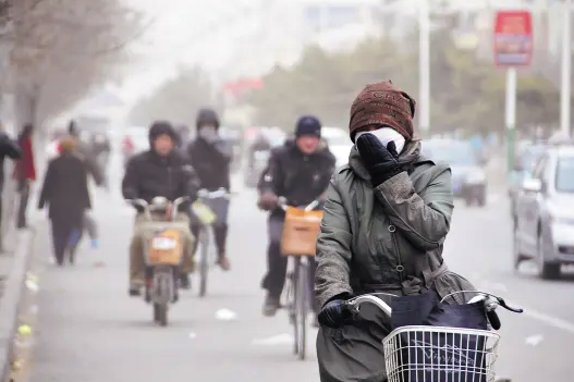 我国多地“速冻” 北京：出现大风降温天气