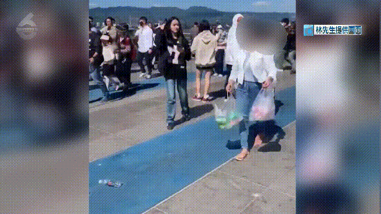 女子在海埂大坝丢塑料瓶等垃圾摆拍作秀起公愤 有市民表示这是对自己城市的污蔑!