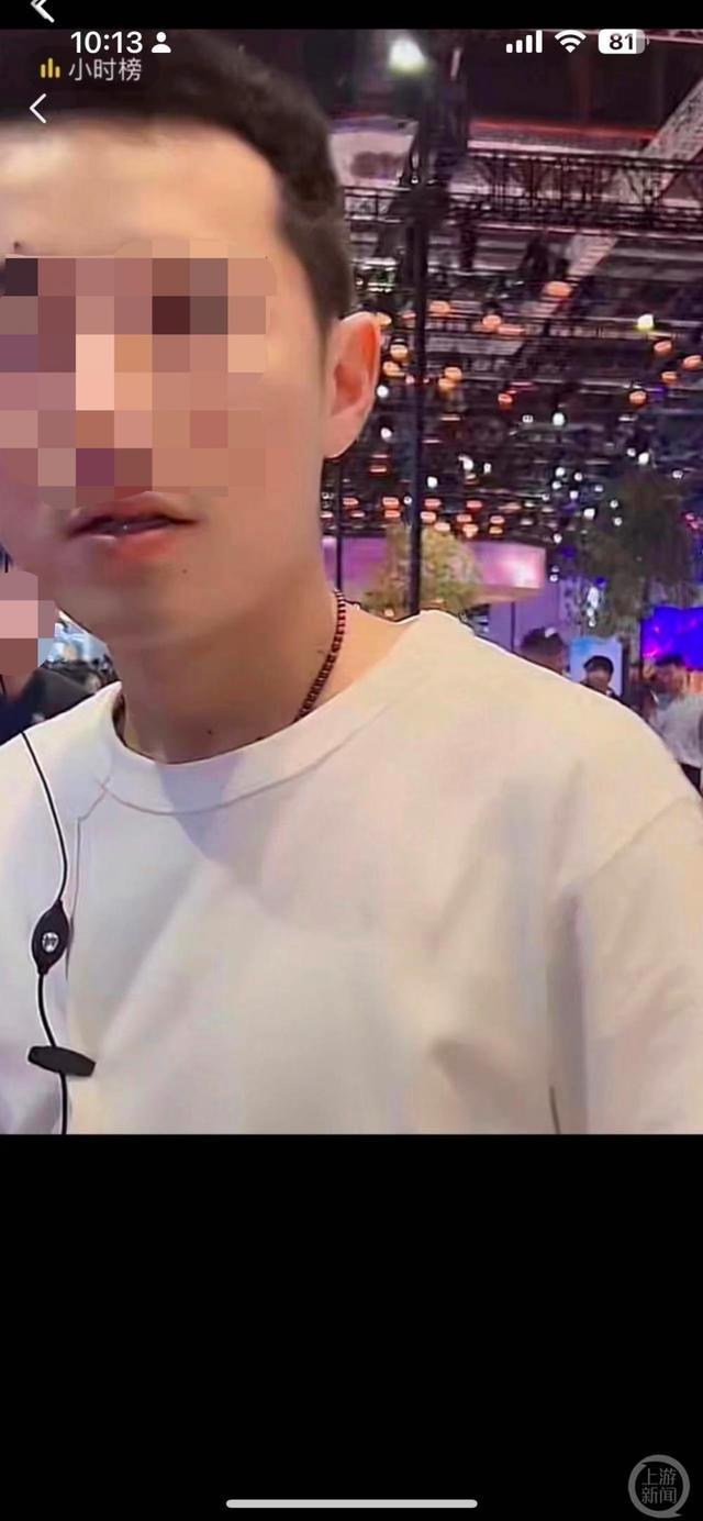 上海车展宝马展台被拖走女子否认蹭热度 要求宝马道歉