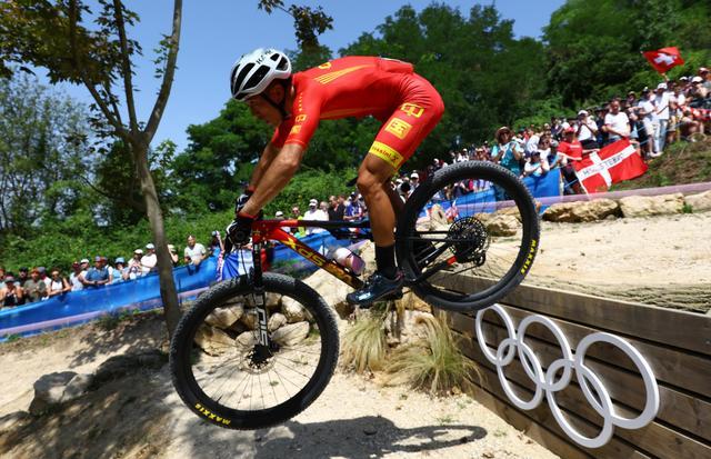 贵州运动员米久江出战巴黎奥运会 刷新中国山地自行车海外最佳名次