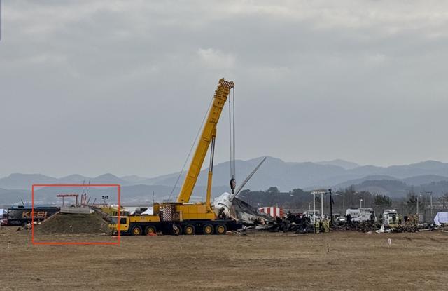 韩国空难机场跑道尽头为啥有墙 墙体设计引争议