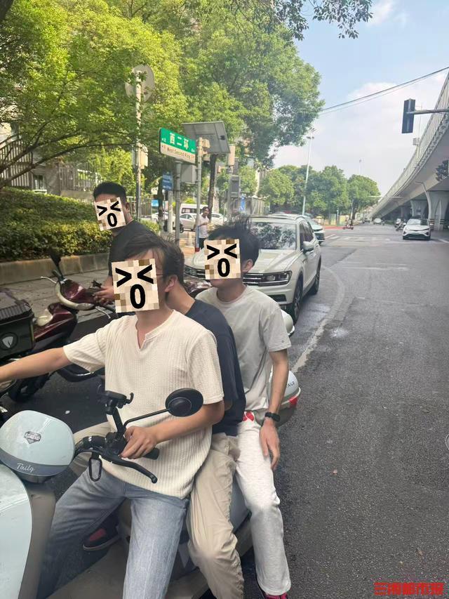 电动车载多人未戴头盔 无人机劝阻 安全隐患突出