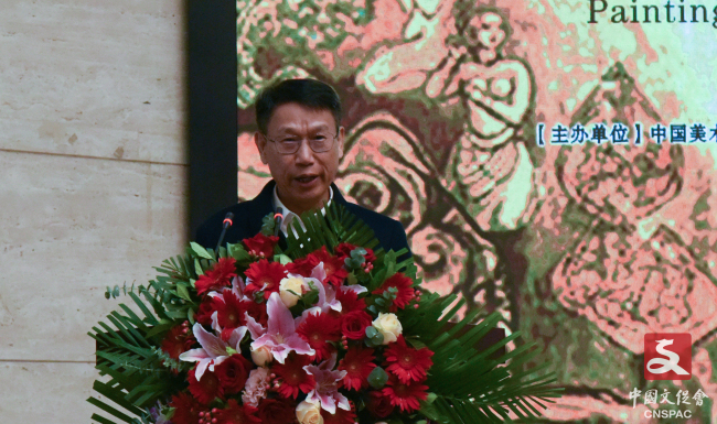 广西文化和旅游厅一级巡视员、广西文联副主席唐正柱宣布展览开幕
