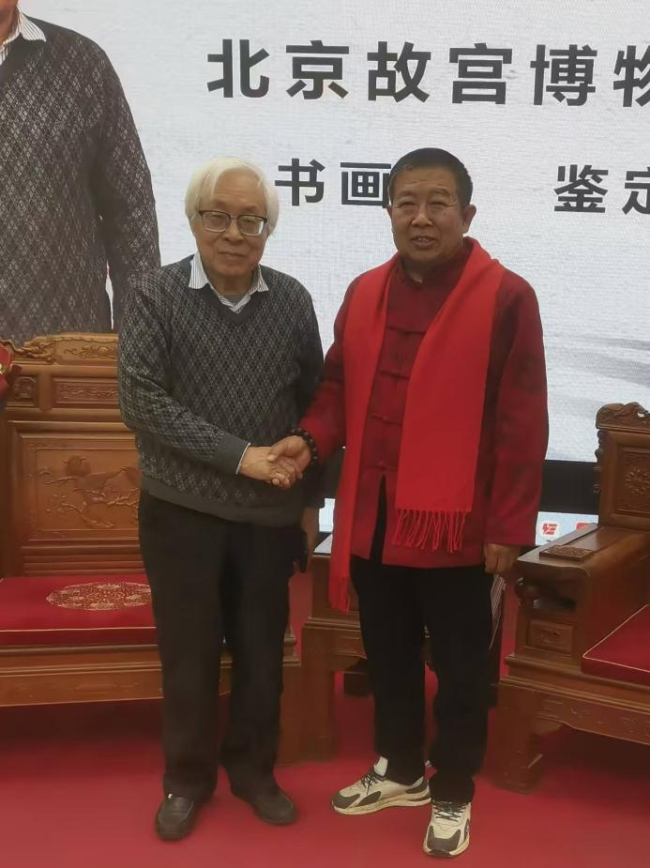 田志英（右）与单国强（左）出席中国古文字研究会合影
