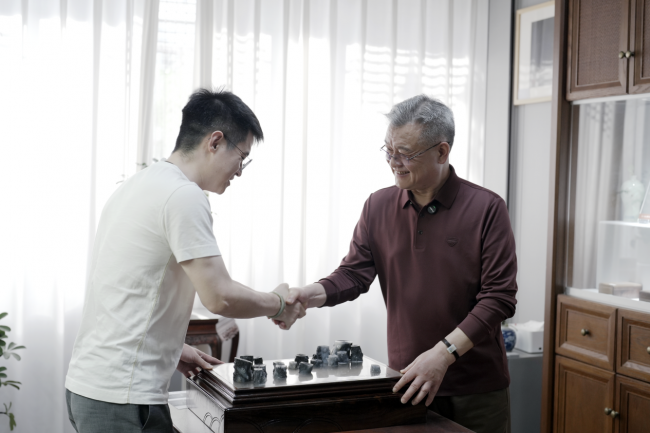 以书画入玉，把一块山料"做"成文化