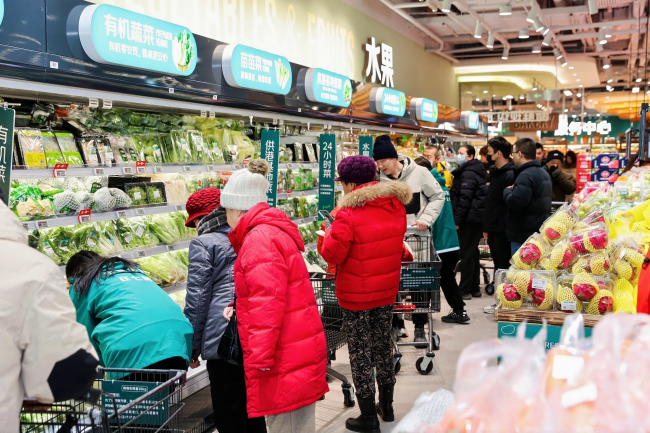 首日超3.5万人涌入,京东七鲜打造春运级开业现象