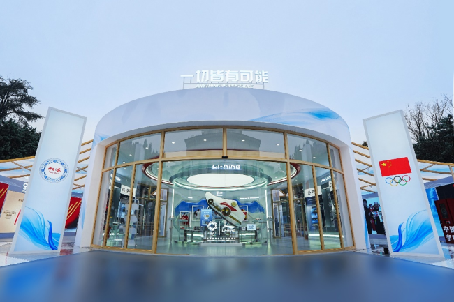 再启“征荣”，中国体育代表团着李宁亮相米兰冬奥会开幕式