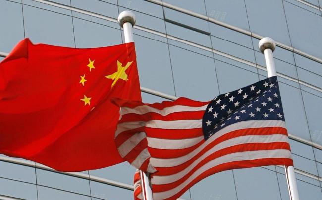 行家：中国毫不会向特朗普关税俯首 坚毅态度不变