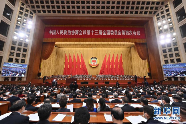 3月7日，全国政协十三届四次会议在北京人民大会堂举行第二次全体会议。新华社记者 李贺 摄