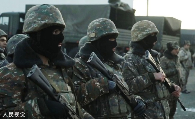 集安组织维和部队已抵达哈首都并执行任务