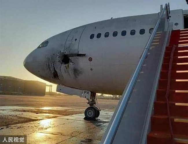 伊拉克首都国际机场遭火箭弹袭击 一架飞机受损