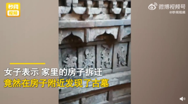 女子老房拆迁挖出千年古墓
