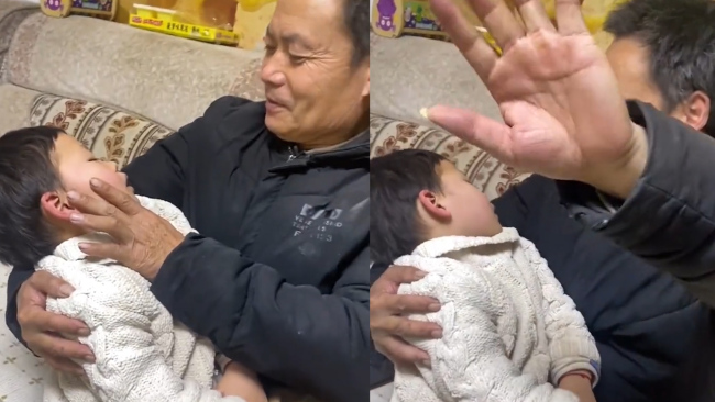 爷爷抱着熟睡的孙子仔细端详：下秒瞬间变脸！