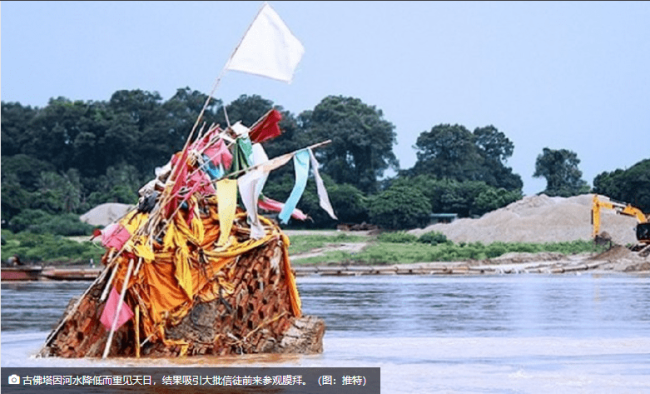 泰国湄公河水位下降露出700年佛塔