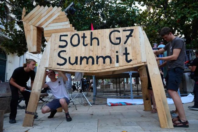 日本记者问中国记者为何要来G7峰会