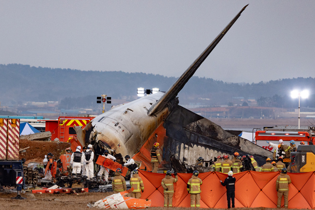 韩国济州航空空疼痛难者遗体整理责任兑现