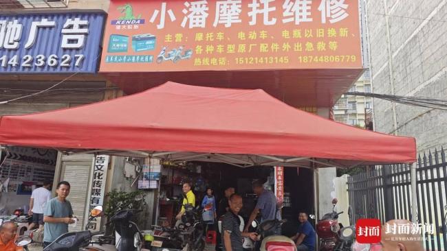 榕江一汽车城被淹有店主损失几百万 全城清污重建家园