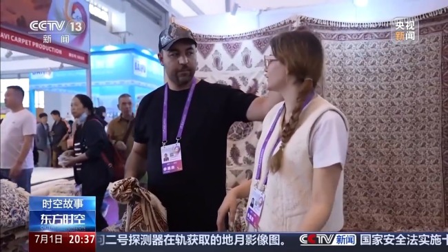 伊朗夫妻来华参展货物被抢购 穿越战火的温暖故事