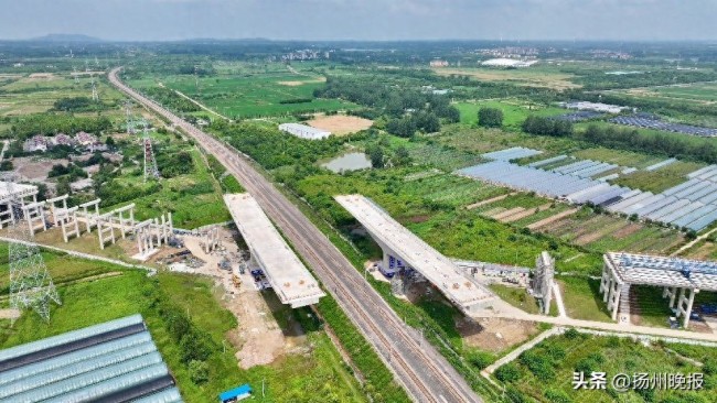 兩萬噸橋梁高空轉體跨越寧啟鐵路， 為什么要轉體？