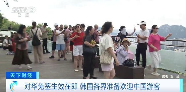 韩国小吃摊挂起中文菜单 迎接中国游客热潮
