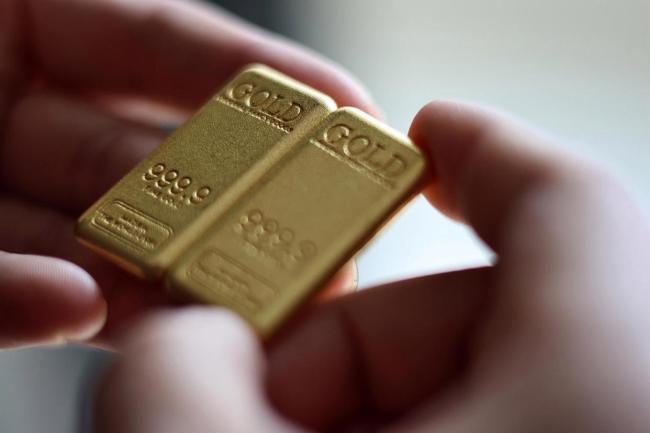 一根10克金条涨到万元以上 新政引发市场波动