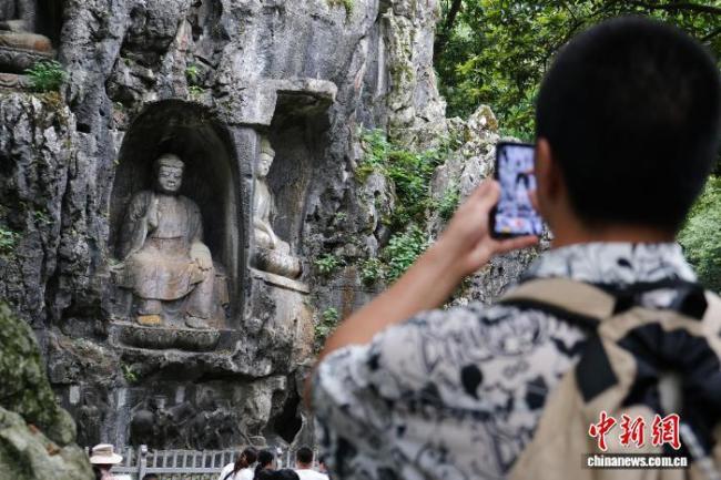 评论员：灵隐寺免门票还景于民 西湖治理新篇章