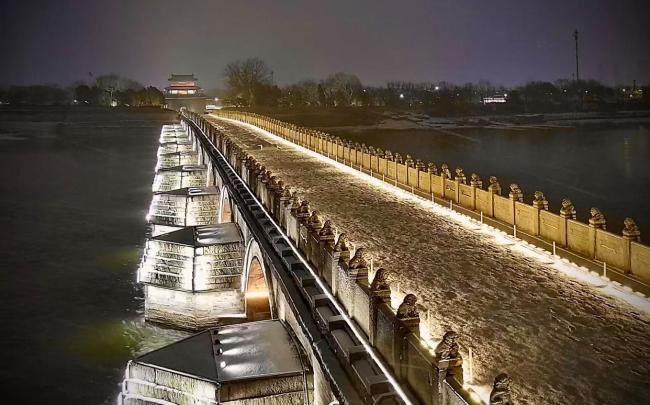 卢沟桥亮灯 古韵雪景添浪漫