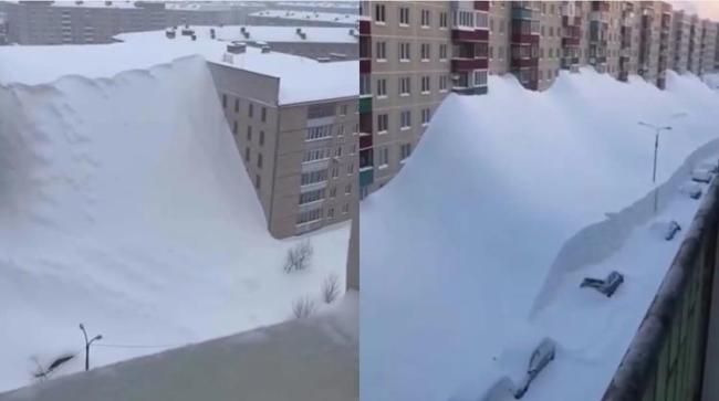 俄暴雪堆出楼高雪坡是假的