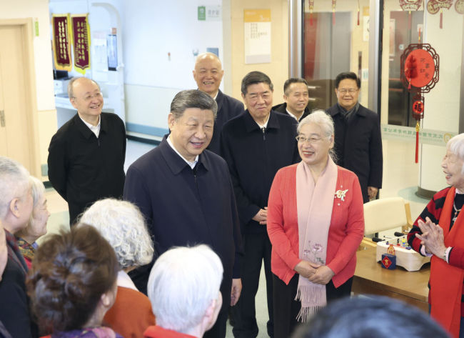 新華圖訊丨習(xí)近平春節(jié)前夕在北京看望慰問基層干部群眾