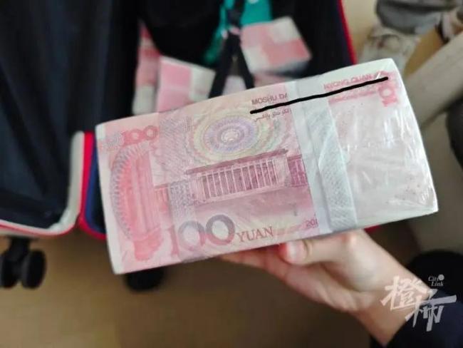 出租屋惊现百万元现金 虚惊一场的真相