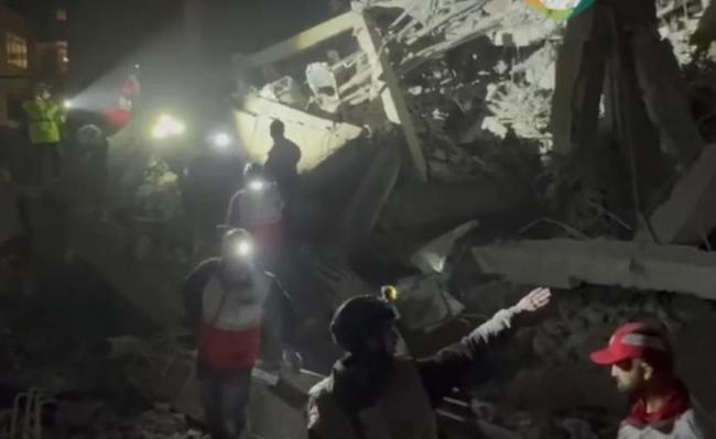 以军袭击伊居民区18人死亡