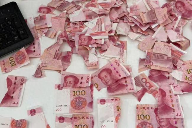 4100元现金被撕成400张碎片