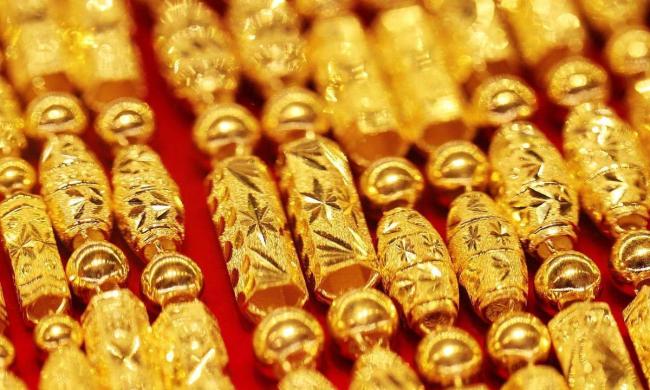 金价起飞后跳水 金饰回收价差大引发关注