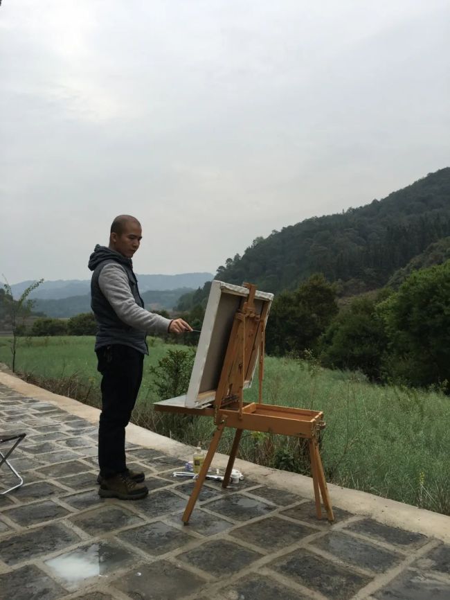 师情画意话何光:闲来油彩撩几笔,种得桃李满天下