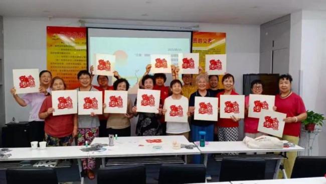 三秦“银龄”启新程，非遗剪纸绘社区新篇