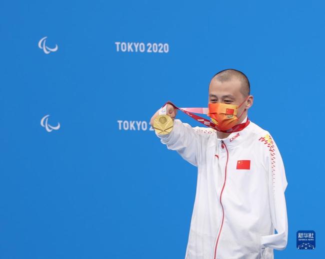 残奥会游泳：贾红光获得男子100米仰泳S6级金牌 